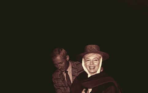 Marilyn is welcomed back to Reno by producer Frank Taylor after a hospital stay. 